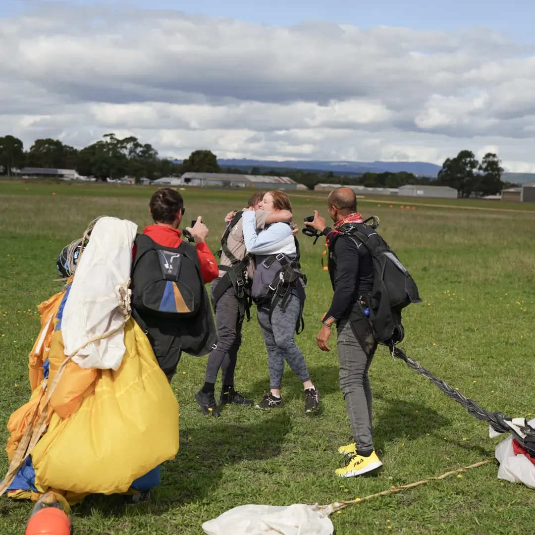Tandem skydivers embracing the thrill of freefall with Commando Skydivers.